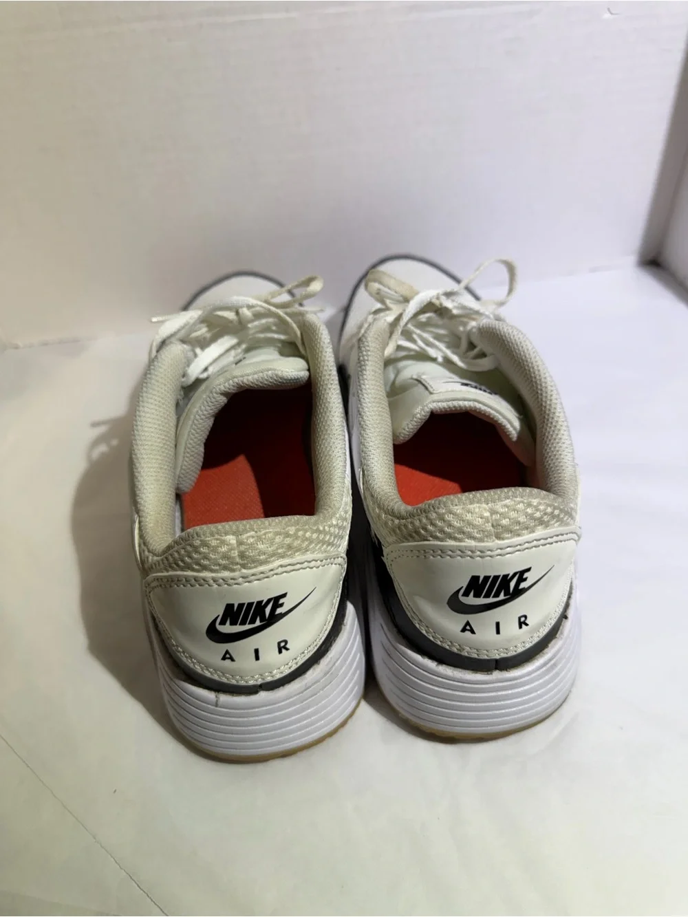 Men's White and Black Athletic Sneakers with Leopard Swoosh